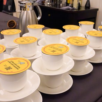 Coffee cups laid out at The Science of Coffee